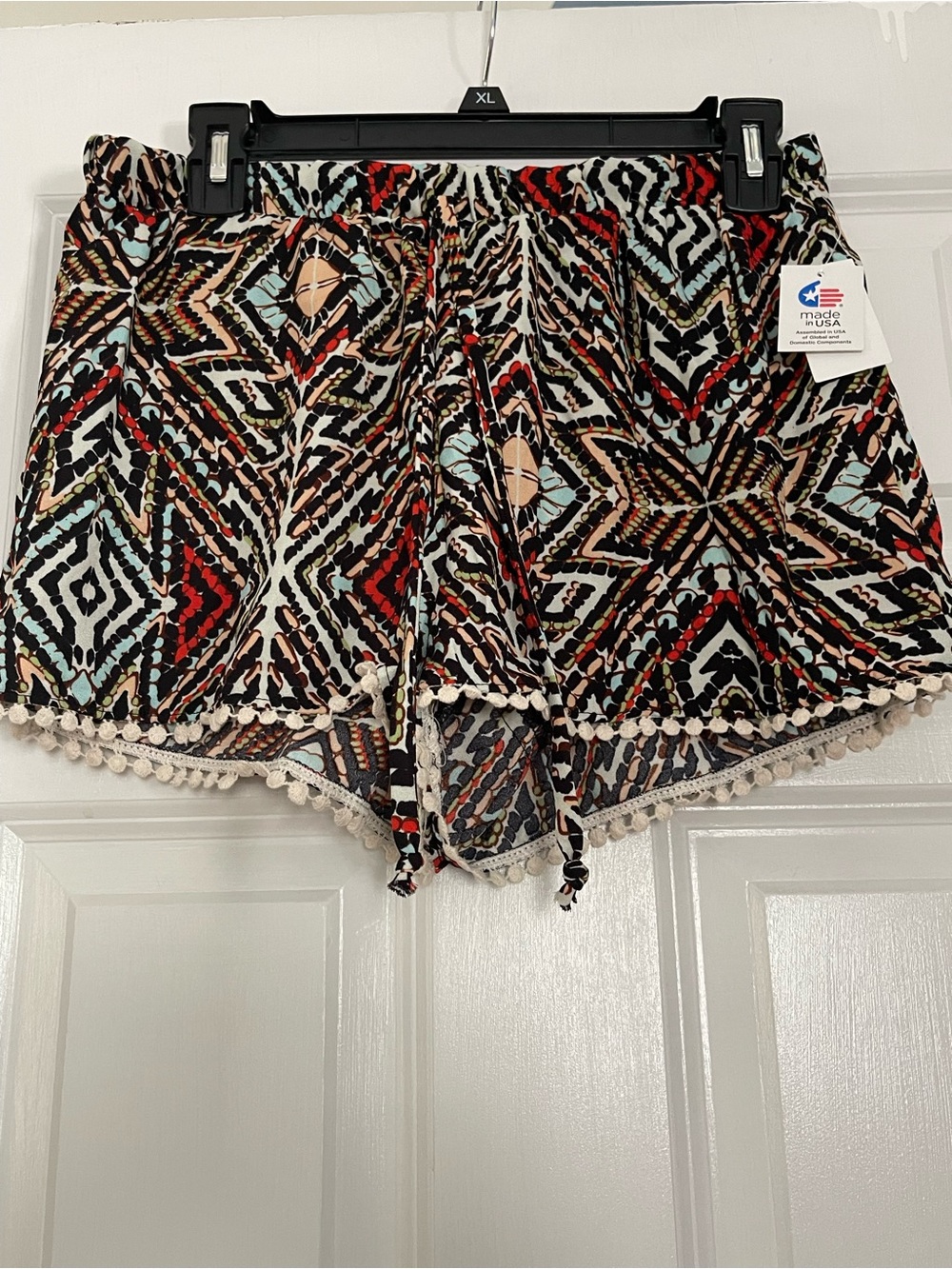 living doll Tribal Print Pom-Pom Hem Shorts in Black, Red, Aqua